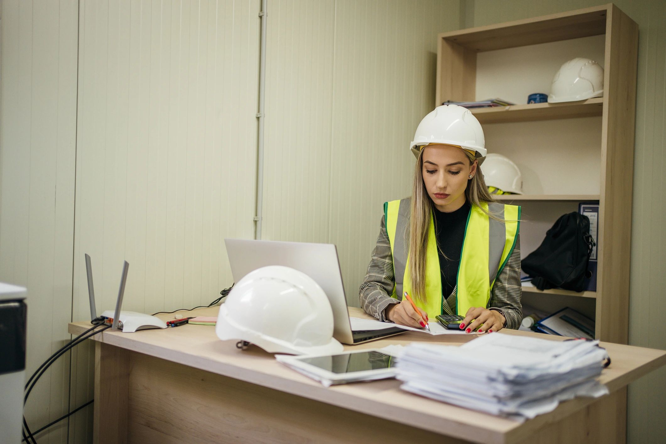 Engineer reviewing HVAC plans and performance data