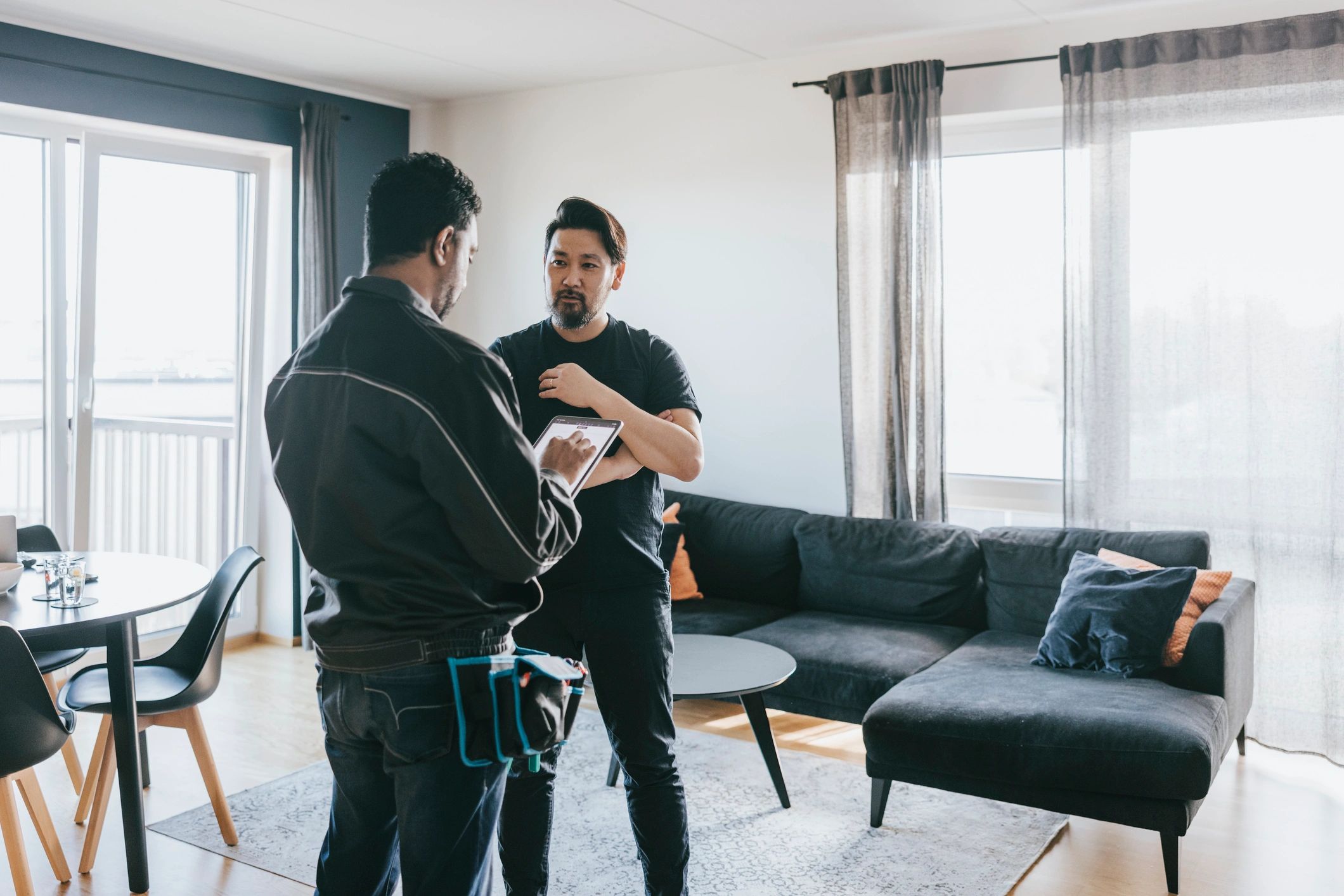 Technician discussing an energy audit with a homeowner