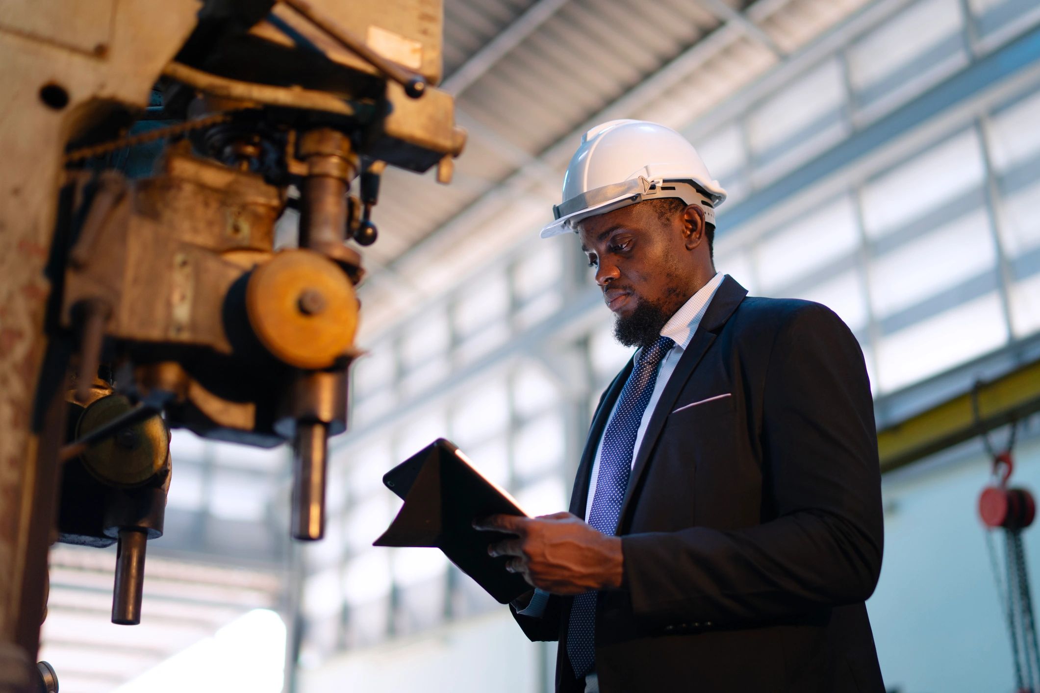 Engineer reviewing building plans for HVAC load calculations
